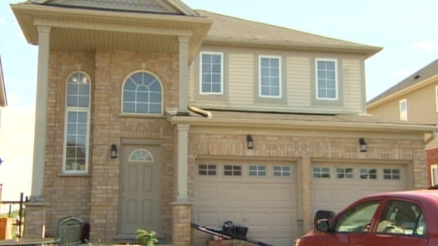 Police say a 10-year-old boy had been locked in a squalid bedroom in this home in London, Ont., for at least 18 months.