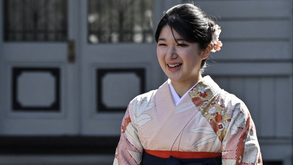 爱子谈到4年大学生活,笑容相当灿烂。 路透社 爱子谈到4年大学生活,笑容相当灿烂。 路透社