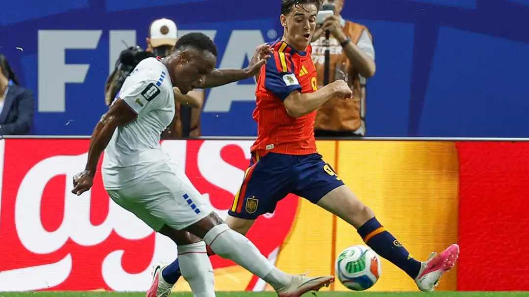 Cabo Verde's Jovane Cabral shoots by Spain's Gavi during the World Cup Group H soccer match between Spain and Cape Verde in Atlanta, Georgia on June 15, 2026.